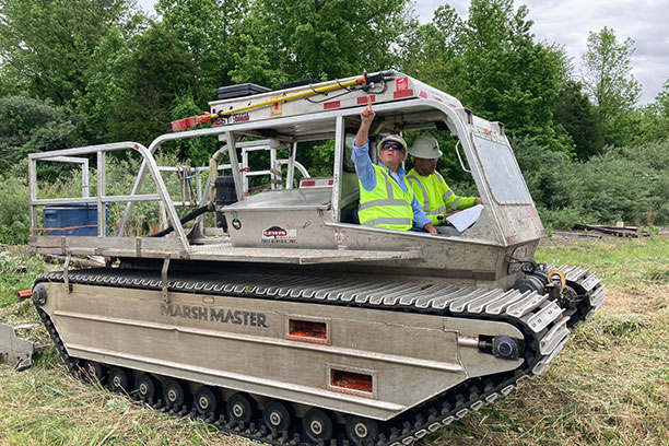 Dennis Brown riding with a crew leader on a job site in Maryland v2